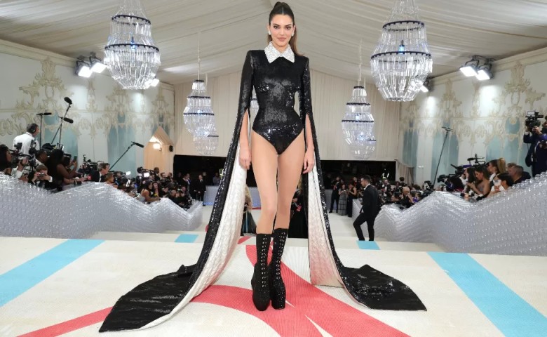 16. Kendall referenced Karl's collar